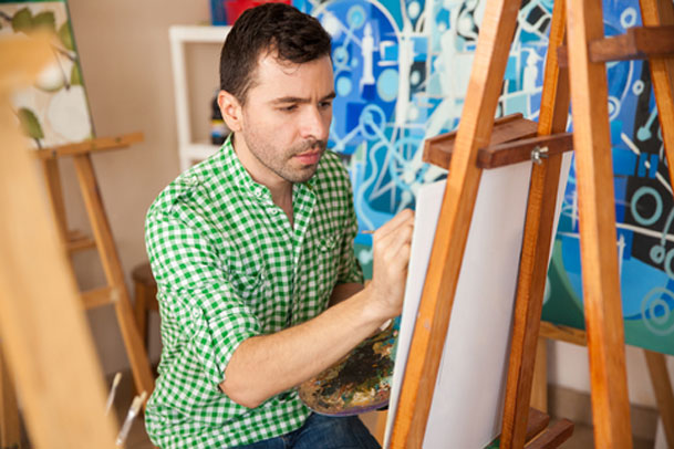 Young man painting